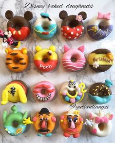 there are many different donuts that have faces on them, including mickey mouse and donald the pooh