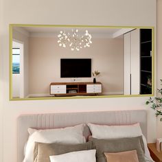 a bedroom with a large mirror on the wall