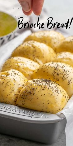 someone sprinkles poppy seed bread into a baking pan