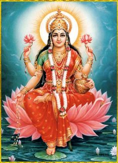 the hindu goddess sitting on top of a lotus flower