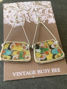 the vintage busy bee earrings are on display