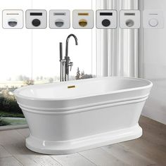 a white bath tub sitting on top of a hard wood floor next to a window