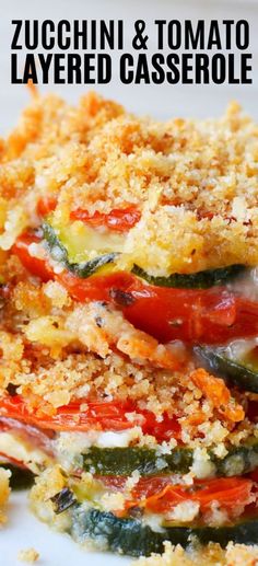 zucchini and tomato layered casserole on a white plate with text overlay