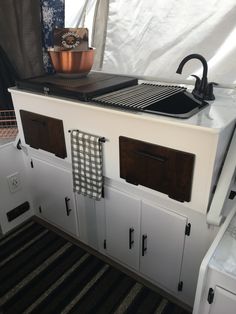 a stove top oven sitting inside of a kitchen