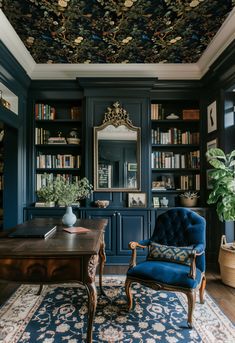 a blue chair sitting in front of a wooden desk