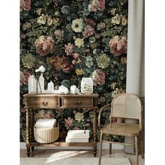 a floral wallpaper in a room with two chairs and a table next to it