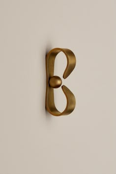 the letter b is made out of brass