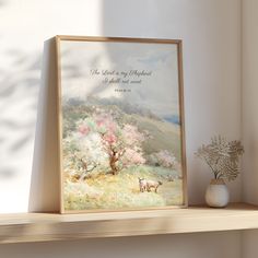 a painting on a shelf next to a vase with flowers