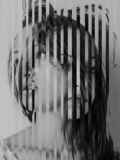 two women with their faces behind bars in black and white, the image appears to be distorted