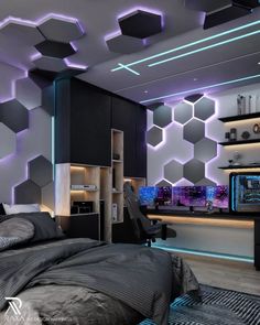 the bedroom is decorated in black and white with hexagon tiles on the walls