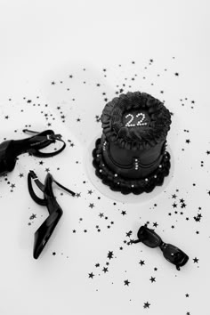 a black and white photo of a 21st birthday cake