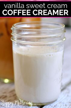 a jar filled with vanilla sweet cream sitting on top of a table