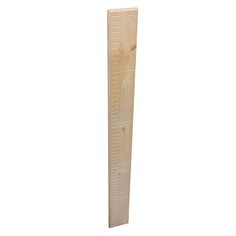 a tall wooden ruler on a white background