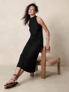 Channel your inner Grecian goddess with this draped maxi dress, crafted in our signature jersey knit—a fabric we love for its softness and beautiful drape.  Column fit.  Mock neck.  Invisible zip at back.  Center back vent.  Fully lined.  Column fit.  Sleeveless.  Maxi length.  Model: Size S, 5'10" (178cm). Riot Grrrl Fashion, Grecian Goddess, Drape Maxi Dress, Jersey Maxi Dress, Confident Style, Jersey Outfit, Maxi Dress Black, Maxi Jersey Dress, Lounge Dress