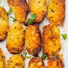 some food is on a white plate and ready to be eaten with parsley sprinkled on top