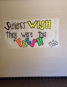 a bathroom with a sign on the wall that says, seniors wish they were this fresh