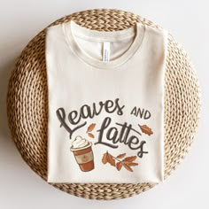 Our fall leaves and pumpkin spice latte coffee cup shirt is a great addition to your fall tee collection! Perfect for all of your fall activities: grabbing coffee, hanging out at the ball field, or under a cute jacket or sweater by the bonfire! Makes a great gift too! SIZE UP for an OVERSIZED FIT (see size chart in listing photos). Are you looking for additional Fall or Halloween themed graphic tees? Check out the following: https://www.etsy.com/shop/TheGraphicPeach?ref=seller-platform-mcnav§ion Fall Coffee Shirt Ideas, Fall Shirt Ideas For Women, Fall Coffee Shirts, Fall Mom Shirts, Coffee Shirts For Women, Autumn Tshirt Designs, Cute Fall Shirt Designs, Fall Shirt Ideas Vinyl, Fall Tshirt Designs Vinyl