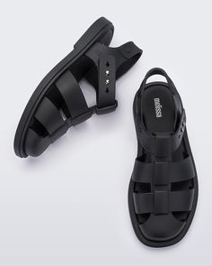 Ever an icon, the Emma sandal takes design inspiration from classic fisherman sandals with contemporary style and comfort. Take on the trend with wide interwoven straps, a matte finish and a rounded toe. Plus, a soft insole and adjustable pin closure keep them comfortable and secure wherever your day takes you. Fisher Man, Gents Shoes, Button Studs, Fisherman Sandals, Melissa Shoes, June Birthstone Jewelry, Gifts For New Mums, Jewelry Ring Box, Pearl Jewellery Earrings