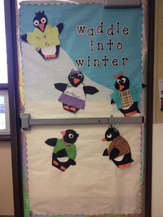 a bulletin board with penguins on it that says waddle into winter and another penguin is in the background