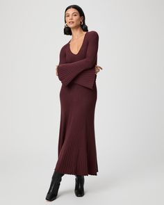 This long sleeve v-neck sweater dress is made from an incredibly soft and comfortable oxblood red ribbed knit material with a flattering contour stitch detail throughout. With a classic a-line silhouette and bell sleeves, the Bel Dress can be worn from day to night. | Bel Dress - Oxblood | Size XL Fall V-neck Solid Color Sweater Dress, Burgandy Knit Dress, Maroon Maternity Sweater Dress, Burgundy Sweater Dress, Casual Non-stretch Long-sleeved Sweater Dress, Brown Knit Long Sleeve Sweater Dress, Oxblood Red, Long Sweater Dress, Stripe Silk