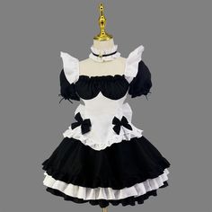 a dress with black and white ruffles on it