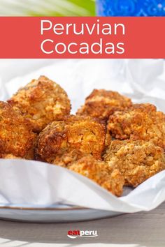 a close up of food in a bowl on a table with the words perjuan cocadas