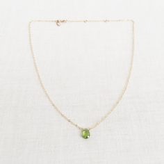 "This is a peridot necklace made of genuine high quality faceted peridot. There are gold filled ,sterling silver and 14kt gold chain you can choose from. Each necklace has 2\" extender. There are 2 sizes that you can choose from 14\"-16\" and 16\"- 18\" in gold filled or sterling silver. 14k gold necklace will be in single size without extender.This is a August birthstone necklace. Peridot jewelry is light weight and elegant. This green peridot is around 1 carats. The green stone necklace is gre Green Peridot Necklace For May Birthstone, Peridot Gemstone Necklace For May Birthstone, Lime Green Peridot Necklace For May Birthstone, Peridot Birthstone Necklace For May, Peridot Faceted Jewelry For May Birthstone, Faceted Peridot Jewelry For May Birthstone, Green Peridot Necklace For Gift, Green Peridot Gemstone Necklace, Lime Green Necklace For May Birthstone Gift