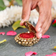 Sindoor is a symbol of fertility and married life. In short, it's the symbol of blissful household life. Also, there are always a lot of expectations with regards to the sindoor box received by the bride at her wedding. It should be attractive so that she can show off the same to guests and well-wishers who visit her after marriage. So, this product is made in designer metal which makes it look highly fashionable, chic, and elegant. Add this to your collection, or gift it to your loved ones on a special occasion to brighten their day. Luxury Cutdana Chandbalis As Gift, Luxury Meenakari Chandbalis As Gift, Luxury Chandbalis As Gift, Cheap Traditional Chandbalis As Gift, Luxury Traditional Chandbalis For Gift, Luxury Fusion Style Chandbalis As Gift, Luxury Chandbalis As Diwali Gift, Housewarming Return Gifts, Fruit Pouches