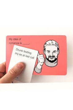 a hand holding a card with an image of a bearded man on it and the caption reads, my idea of romance is drunk sexing any at least can