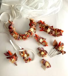 several pieces of cake sitting on top of a white table next to scissors and ribbon