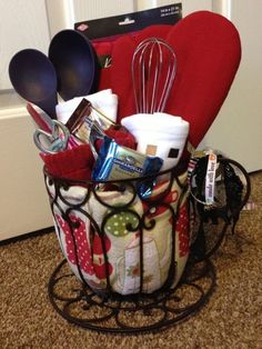 a basket filled with kitchen utensils and other items