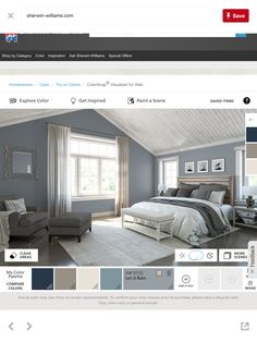 an image of a bedroom with blue and gray colors on the walls, furniture and decor