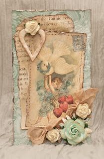 a card with roses and an angel on it