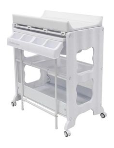 a white baby changing table with two trays on it's sides and wheels