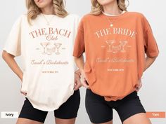 Celebrate your special day with my Custom Bachelorette Party Shirts for the bride and bridesmaids! These stylish, matching bridal party tees feature "The Bach Club" and "The Bride Club" designs, complete with cocktail and shot glass illustrations. Whether you're headed out for a fun night or enjoying a weekend getaway, these shirts will keep your bridal squad looking cohesive and trendy. Why Purchase From My Shop? At Wow A Print Paradise, I believe in celebrating life's special moments with custom apparel that tells your story. Whether you're gifting or wearing it yourself, each item is designed with love and care. Superior Materials: Experience all day comfort and style with our premium apparel, crafted from top-quality brands like Comfort Colors, Bella Canvas, and Gildan. Designed to be Bridal Squad, Bachelorette Shirts, Bachelorette Party Shirts, Gildan Sweatshirts, Luxury Bridal, Club Design, Toddler Tees, Bridal Party Gifts, Brides And Bridesmaids