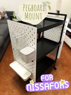 this is an image of a miniature model of a pegboard mount for missafords