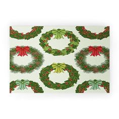 christmas wreaths and bows on white background