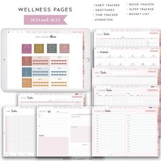 the printable planner is shown on top of a tablet and in front of it