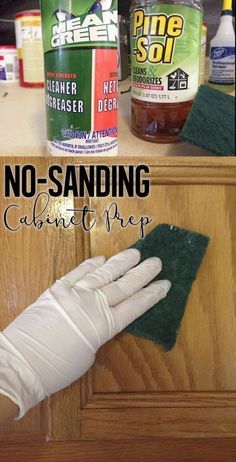 a pair of white gloves on top of a wooden cabinet next to cleaning cloths