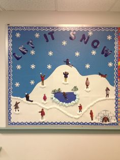 a bulletin board with people on it and snowing in the background that says let it snow