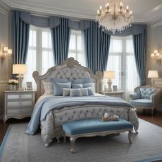 a bedroom with blue and white decor, chandelier, bed, chair and window