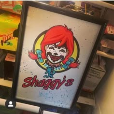 a sign that says shaggy's with a clown face on it