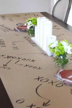 a table with flowers and candles on it