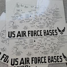 two us air force bases stickers are on top of each other in black and white