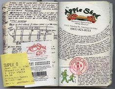 an open book with writing and stamps on it