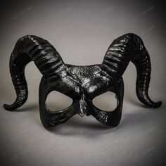 This Devil Mask With Back Twisted Horns Is Made From Plastic, Then Decorated And Hand Painted To Give It An Beautiful Black Texture Look. The Mask Is About 12" Tall And 14" Wide. The Masquerade Mask Will Make A Great Costume Accessory. Product Feature Made From Plastic With Plastic Plastered And Handcrafted And Hand Painted. Great For A Masquerade Ball, Venetian Costume, Halloween Costume Features Mythological Beasts May Also Be Used As A Display Piece Hand Painted With An Unique Texture Finish Demon Masquerade Mask, Scary Mask Ideas, Unique Masquerade Mask, Masquerade Ball Men, Masquerade Mask Aesthetic, Ram Mask, Mythological Beasts, Beast Mask, Ballroom Extravaganza