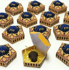 an open box with some chocolates in it on a white surface and many other boxes