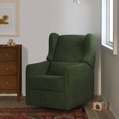 a green recliner chair sitting in a living room next to a dresser and window