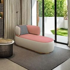 a living room filled with furniture next to a sliding glass door