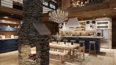 a dining room and kitchen area in a house with wood floors, stone fireplace, and chandelier